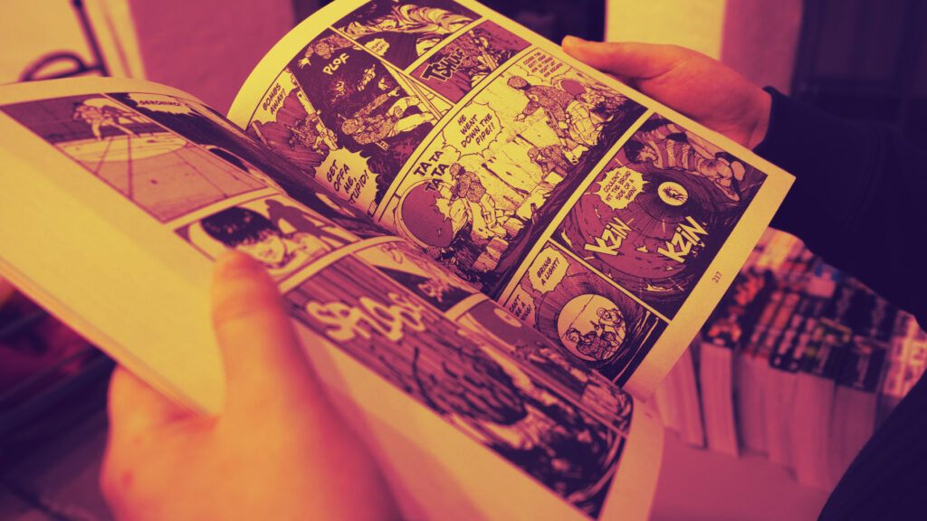 Young person reading graphic novel
