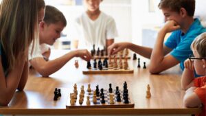 Young people playing chess